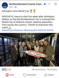 A screenshot of a Facebook post saying Ashington has won the world cup of stations, with a photo of a group of people celebrating
